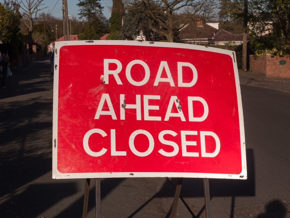 Road ahead closed sign