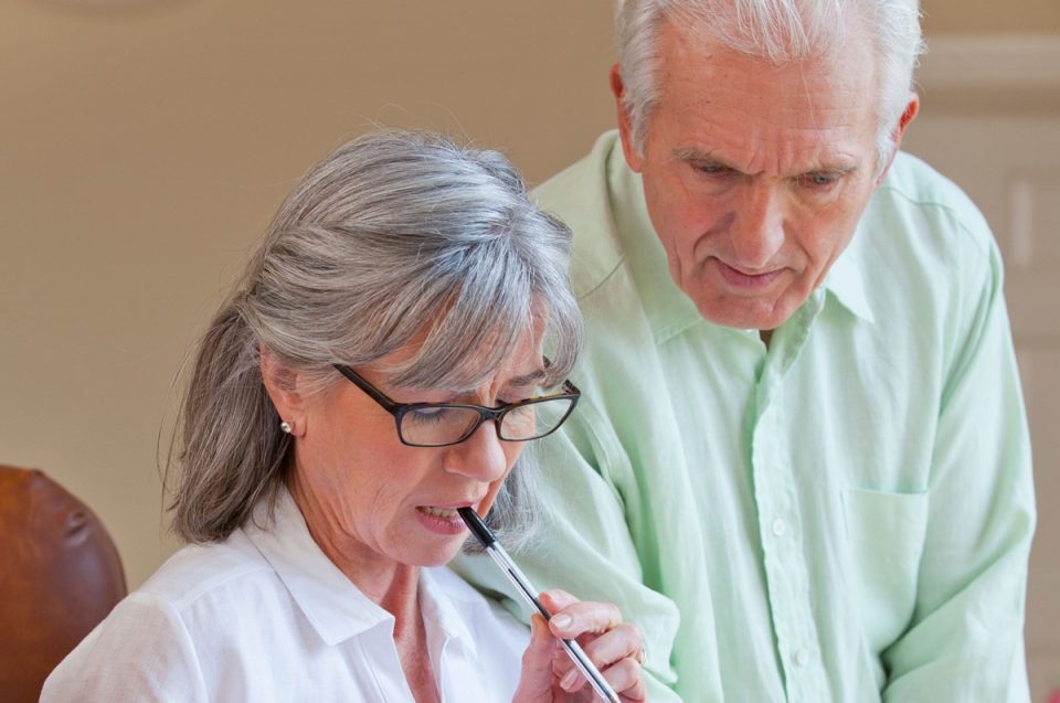 Older couple studying their IHT and pensions situation