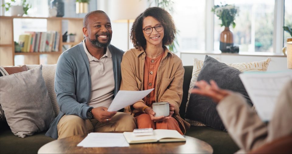 Middle-aged couple consulting advice.