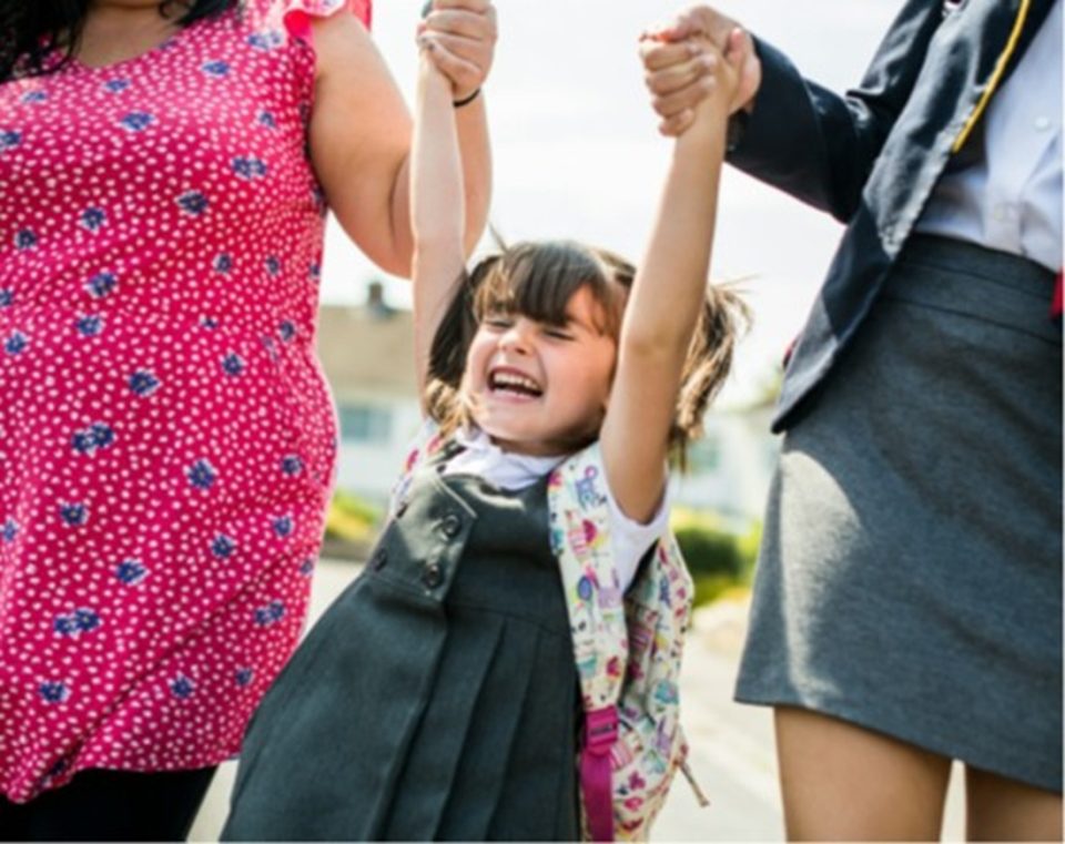 Little girl on way to school