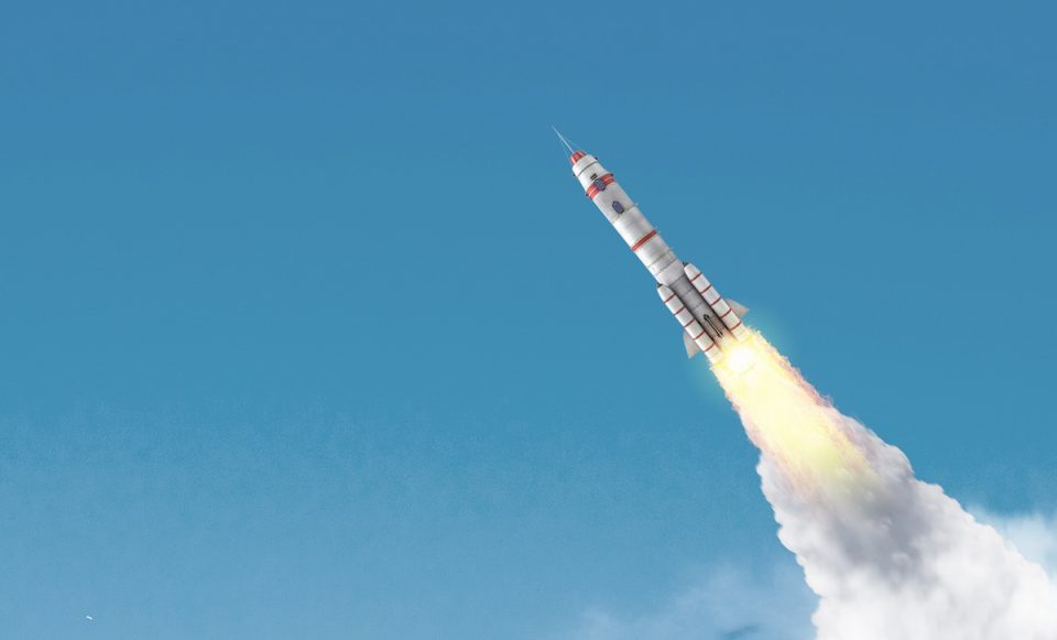 A rocket flying through the sky